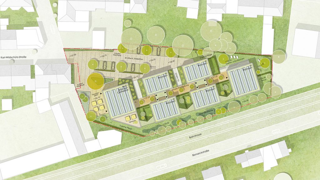 Lageplan des Wettbewerbsentwurfs Karl-Wildschütz-Platz in Fröndenberg mit Baukörpern entlang der Bahntrasse, Vorplatz und Grünflächen