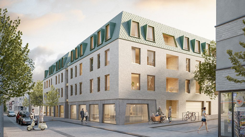 Neubau Ecke Bahnhofstraße und Friedrichstraße in Kornwestheim mit begrüntem Dach und Ladenflächen im Erdgeschoss