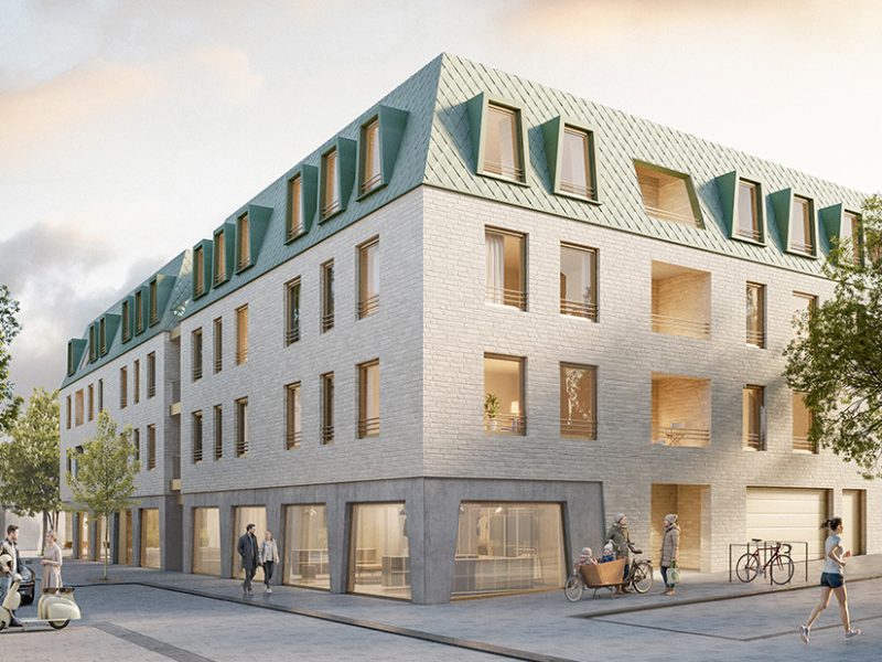 Neubau Ecke Bahnhofstraße und Friedrichstraße in Kornwestheim mit begrüntem Dach und Ladenflächen im Erdgeschoss